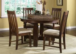 Classically designed, the amish dining table features a square or clipped corner table top with optional extension leaves. Urban Mission Oak Casual Dining Furniture Set