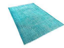 distressed turquoise rug at pamono
