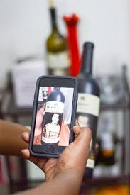 Hovering a mobile device over the bottles will bring the character on the label to life. Get Interactive With Living Wine Labels Lots Of Sass