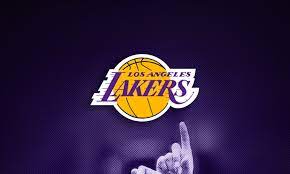 The los angeles lakers 2020 nba champions logo features a black shield on a yellow rectangle, within the shield is the larry o'brien trophy, the lakers logo at the bottom, and 17 stars. Los Angeles Lakers Logo Design Und Geschichte Turbologo