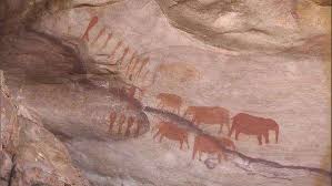 cave paintings of people and elephants