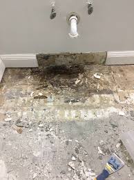 Dispose of tiles that were damaged during the removal process. Replacing Tile In Half Wood Half Concrete Subfloor Bathroom Diy Home Improvement Forum