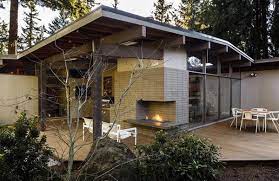 Typical homes of the time were compact brick houses with asphalt shingles and small windows, explains andrew while eichlers originally were built as affordable housing options, today they are widely considered by. Post And Beam Remodel In Portland Architect Lover Modern Outdoor Fireplace Mid Century Exterior Mid Century House