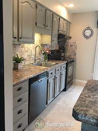 gray painted oak cabinets and kitchen