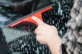 cleaning car windshields and windows