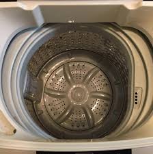 A washing machine with an impeller uses less motion and water than a washer with an agitator. Could I Graft An Agitator Onto My Washing Machine S Impeller Or Just Replace The Impeller With An Agitator Entirely Techsupportmacgyver
