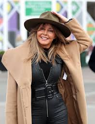 Carol vorderman wins rear of the year. Carol Vorderman Sports Skintight Leather Catsuit For Day At Cheltenham Races Mirror Online