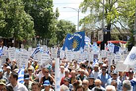 The main dialect groups are the western, eastern, and northern. File Macedonian Greek Australians Rally In Melbourne People With Flags And Signs Jpg Wikipedia