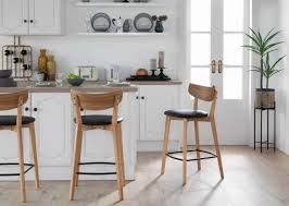 oak bar stool with black faux leather