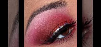 red eyeshadow with glitter eyeliner