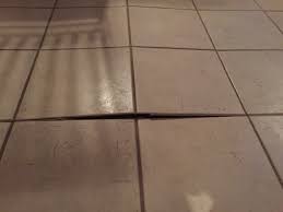 kitchen floor tiles popped out of floor