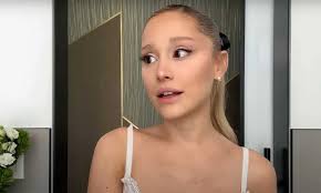 ariana grande tears up talking about