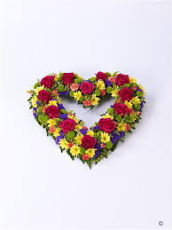 Browse and order open and closed heart funeral flower tributes online for delivery in sussex. Vibrant Open Heart Funeral Flowers Birmingham
