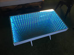 I'll start by saying that i recently sold this table and don't have access to it anymore. Infinity Led Coffee Table Living Room Furniture Home Garden Store Tables Cate Org