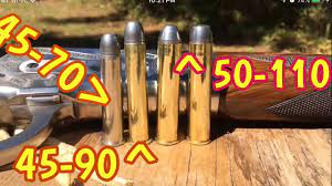 45-70 gov vs 45-90 win vs 50 Express 1886 Winchester Big Bore Lever Action  Rifle vs hardwood - YouTube