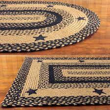 black and tan braided rug with stars