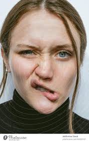 funny woman making face in studio a