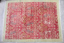 birds red handknotted wool rug