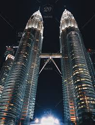 According to the ctbuh's official definition and ranking, they were the tallest buildings in the world from 1998 to 2004 until surpassed by taipei 101. Petronas Twin Towers At Night Stock Photo 21d3a1c7 Ecb4 4d3f B7a0 964462d5a8c3