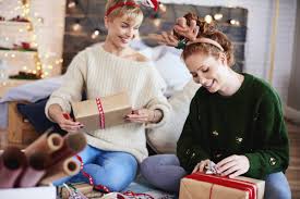 Find an amazing range of christmas gifts for women for all the important ladies in your life. Young Women Preparing Christmas Gifts Close Up Friendship Stock Photo 226682584