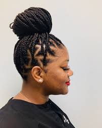Whether you prefer a casual curly look like the next attach the braiding hair to your bun. 25 Must Have Updo Hairstyles For Black Women Hairstylecamp