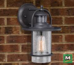 Patriot Lighting Dualux Merrick Motion Activated Outdoor Wall Light Features An Oil Rubbed Bronze Finish And Cle Solar Light Bulb Bronze Lighting Vintage Bulb