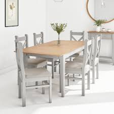 A dining room is so much more than just a table with chairs. Extendable Dining Table 6 Chairs In Fabric Solid Oak Adeline Furniture123
