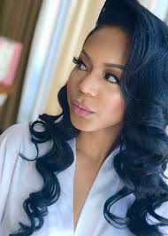 It is a smooth updo for the wedding with a large braid wrapped around the bun. Hairstyles For Black Women Wedding Loose Curls Hairstyles Hair Styles Loose Hairstyles