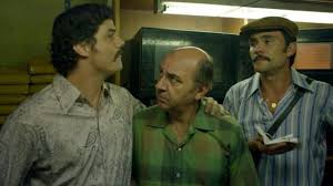 A chronicled look at the criminal exploits of colombian drug lord pablo escobar, as well as the many other drug kingpins who plagued the country through. The Striped Shirt White And Blue Worn By Gustavo Gaviria Juan Pablo Raba In The Drug Traffickers S01e01 Spotern