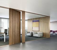 Glass Office With Wood Walls And Door