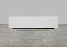 The modloft lenox media cabinet in glossy white is a sleek modern tv stand smartly designed for functionality and storage. White Lacquer Walnut Large Media Console