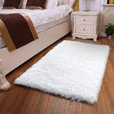 white faux fur sheepskin area rug