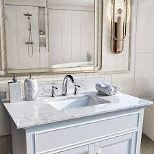 This single vanity comes in four classic colors and boasts a solid carrara marble top and ceramic oval sink. Unie 43x22 Inch Bathroom Vanity Single Sink White Carrara Marble Countertop With Faucet Hole Back Splash For Bathroom Not Include The Cabinet Amazon Com