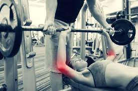 treat elbow pain from weightlifting