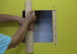 how to repair large holes in walls and