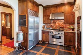 Copper backsplash sheet offers easy way of installation. Copper Backsplash In The Kitchen Cottage Journal