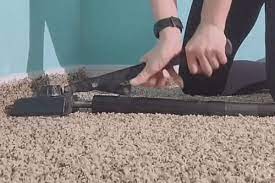 how to stretch buckled carpet easy