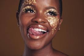gold glitter and black woman beauty