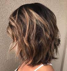 The most popular medium hairstyles include long bobs, shaggy styles, layers, bangs, side parts, blunt cuts, waves, and curls. 50 Best Medium Length Layered Haircuts In 2021 Hair Adviser