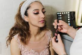 makeup artist applying makeup to a