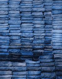 stacks of denim folded jeans