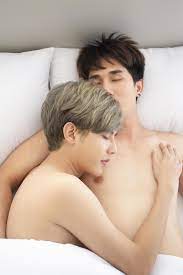 A male couple with an Asian man sleep together in a bed, a symbol of sexual  diversity, expressing openly gay men accepting LGBT concepts. 6783620 Stock  Photo at Vecteezy