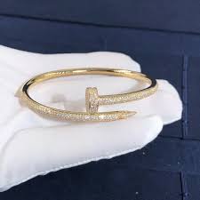 un clou nail bracelet 18k yellow gold