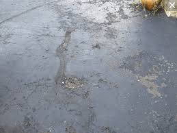 Repair your driveway without wasting money. How To Repair Seal Your Asphalt Driveway Armorgarage