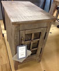 A drawer and a shelf let you keep remotes. Broyhill Chairside Table Costco Weekender