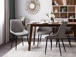 A nailhead trim decorates the chair sides. Set Of 2 Faux Leather Dining Chairs Grey Maribel Beliani De