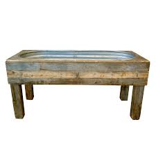 galvanized trough with wood stand