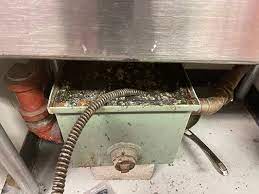 how to unclog a grease trap
