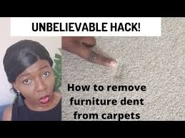 how to remove carpet dents left by