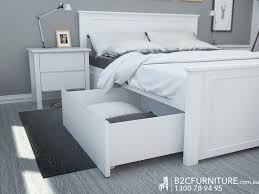 white queen bed frame with under bed